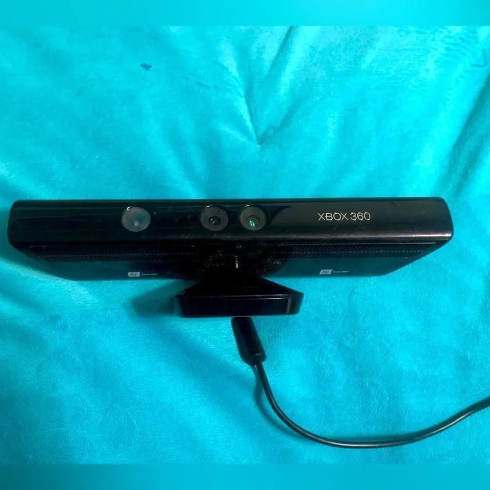 Xbox 360 Kinect Sensor. Used, but in good condition.